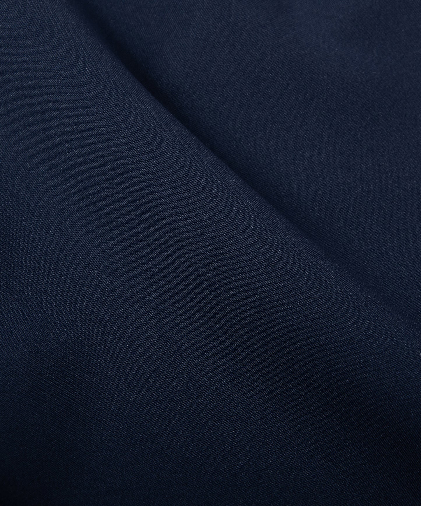 CUSTOM_ALT_TEXT: Fabric closeup on Paper Planes Basketball Short color Midnight.