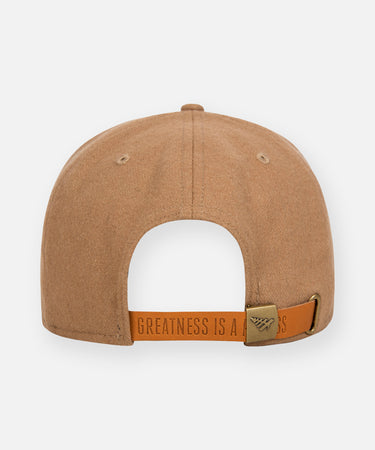 CUSTOM_ALT_TEXT: Embossed leather backstrap and antique brass buckle on Paper Planes Wool Melton Crown 9Fifty Leather Strapback Hat, color Camel.