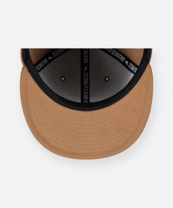 CUSTOM_ALT_TEXT: Camel faux suede undervisor on Paper Planes Wool Melton Crown 9Fifty Leather Strapback Hat, color Camel.