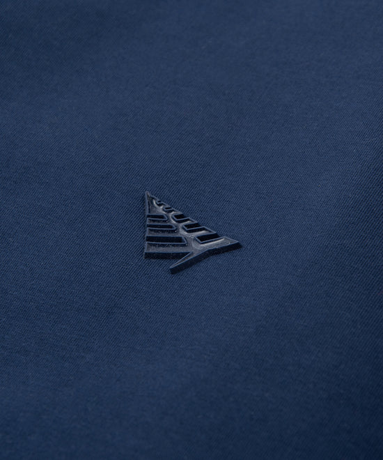 CUSTOM_ALT_TEXT: Glossy silicone Plane chest icon on Paper Planes Chromatic Crewneck Sweatshirt color Naval Academy.