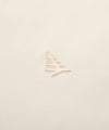 CUSTOM_ALT_TEXT: Glossy silicone Plane chest icon on Paper Planes Chromatic Crewneck Sweatshirt color Vapor.