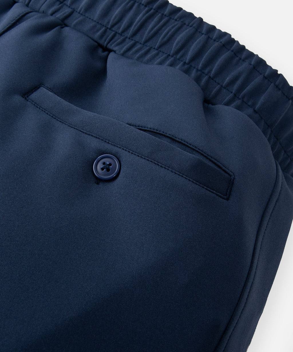  Single welt button-through back pocket on Paper Planes Slim Fit Chromatic Jogger color Naval Academy.
