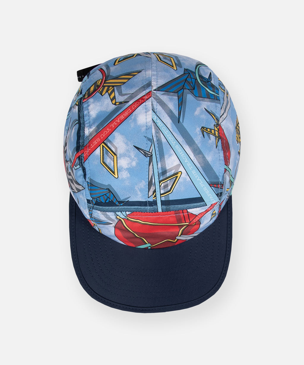  Top view with printed crown and solid navy contrast visor on Paper Planes Camper, color Azure Blue.