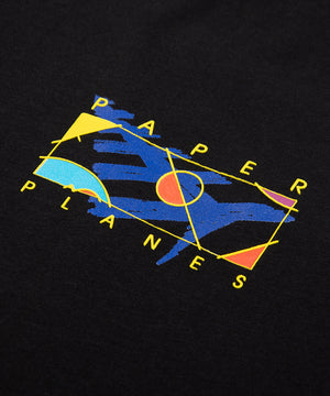 CUSTOM_ALT_TEXT: Closeup of printed chest artwork on Paper Planes The Paint Tee, color Black.