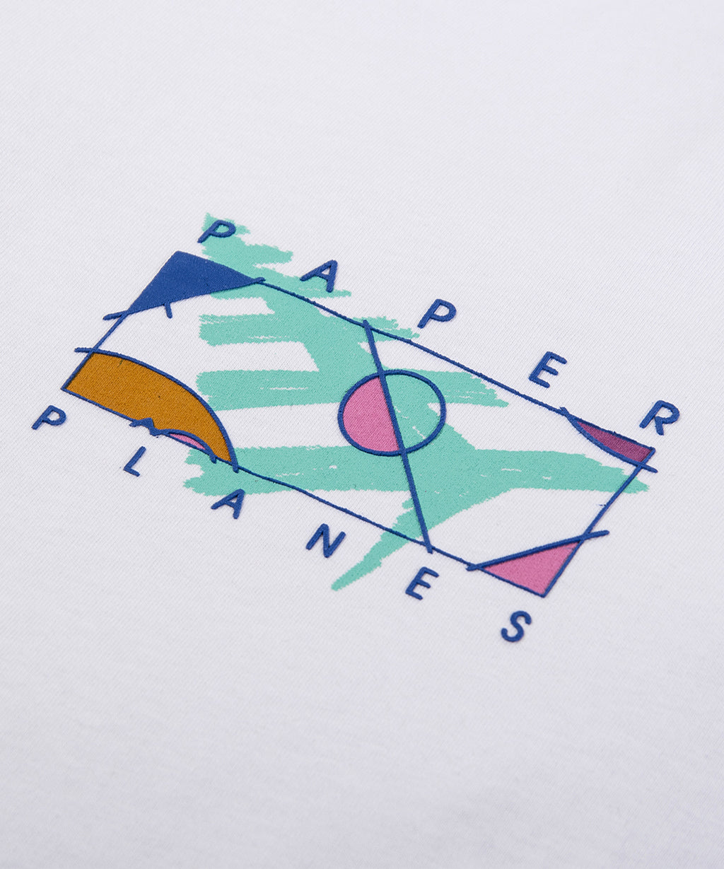  Closeup of printed chest artwork on Paper Planes The Paint Tee, color White.