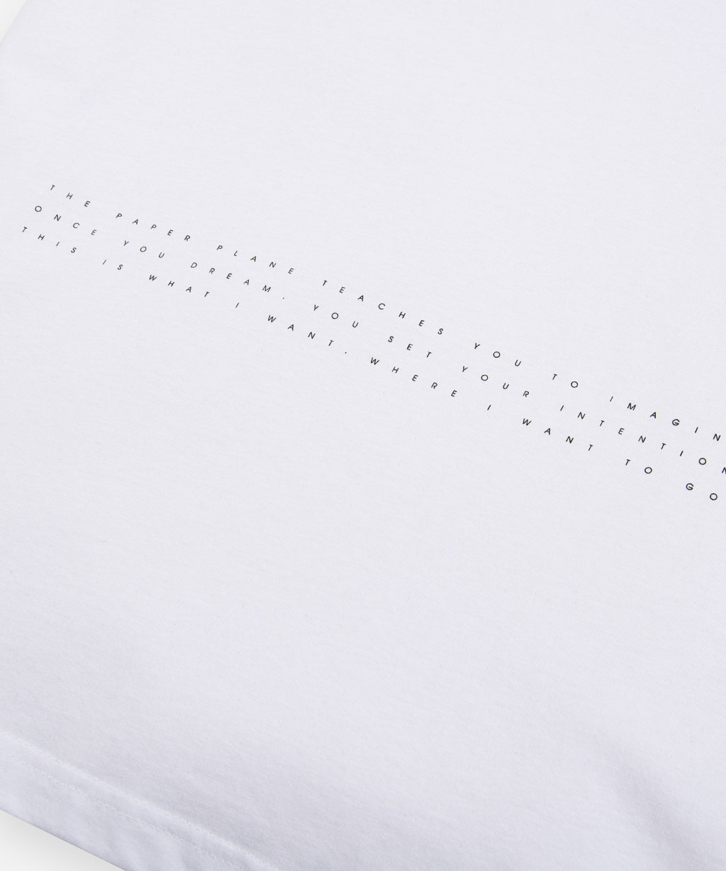  Planes mantra print closeup on Paper Planes The Paint Tee, color White.
