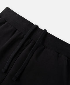  Elasticated waistband with hidden interior drawcord on Paper Planes Slim Fit Sweatpant, color Black.