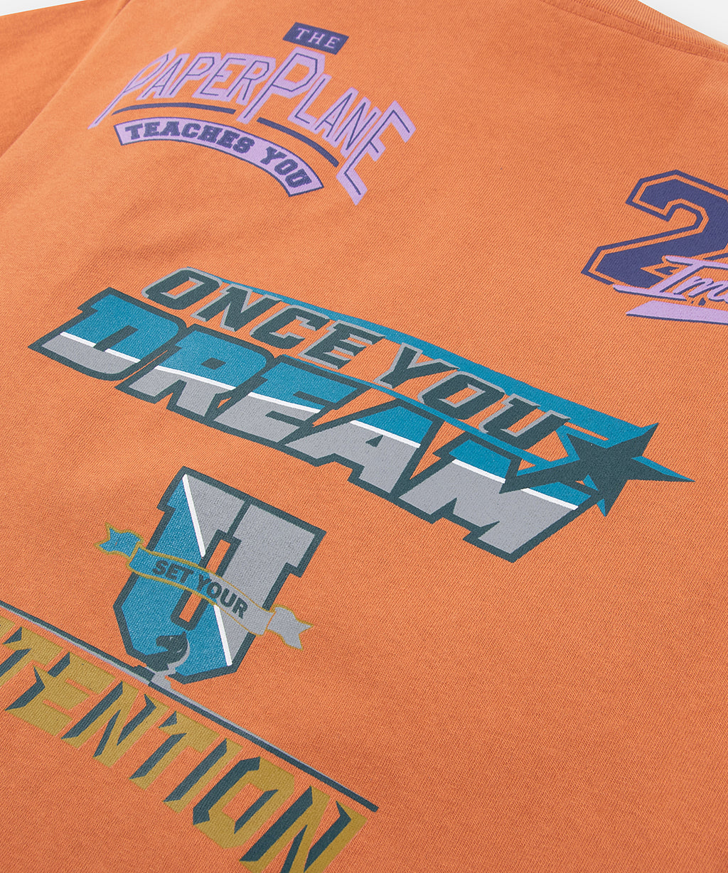  Printed art closeup on Paper Planes Intention It Heavyweight Tee, color Ginger.
