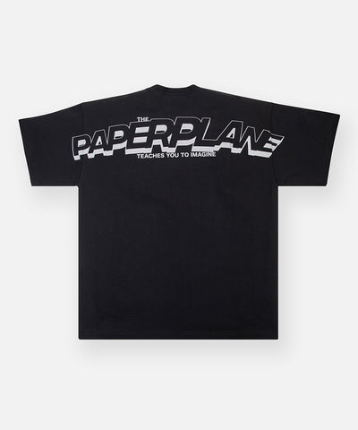 CUSTOM_ALT_TEXT: Back of Paper Planes Crossover Oversized Heavyweight Tee with reflective print, color Black.