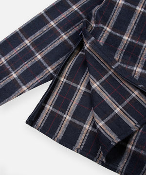CUSTOM_ALT_TEXT: Zippered opening at right bottom side seam on Paper Planes Plaid Brushed Flannel Tunic.