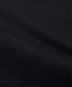 CUSTOM_ALT_TEXT: Closeup of jersey stitch on Paper Planes Trusted Crewneck Sweater.
