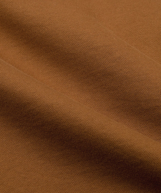 CUSTOM_ALT_TEXT: Fabric closeup on Paper Planes Open Hem Half Zip Sweatshirt, color Rubber.