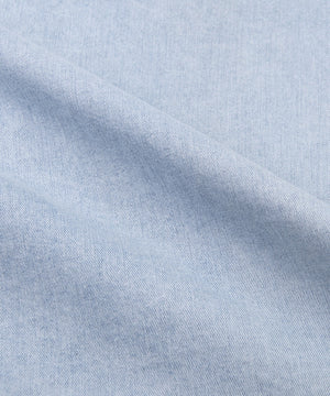 CUSTOM_ALT_TEXT: Fabric closeup on Paper Planes Explorer's Life Denim Shirt, color Light Wash.