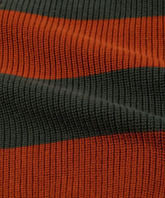 CUSTOM_ALT_TEXT: Half cardigan stitch on Paper Planes Striped Crewneck Sweater, color Ginger.