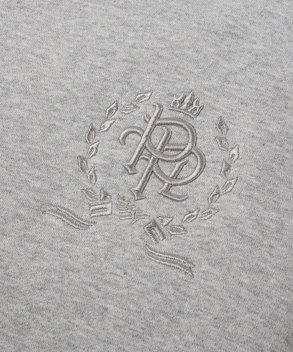  3-D embroidered PPL chest crest on Paper Planes Crest Hoodie, color Heather Grey.