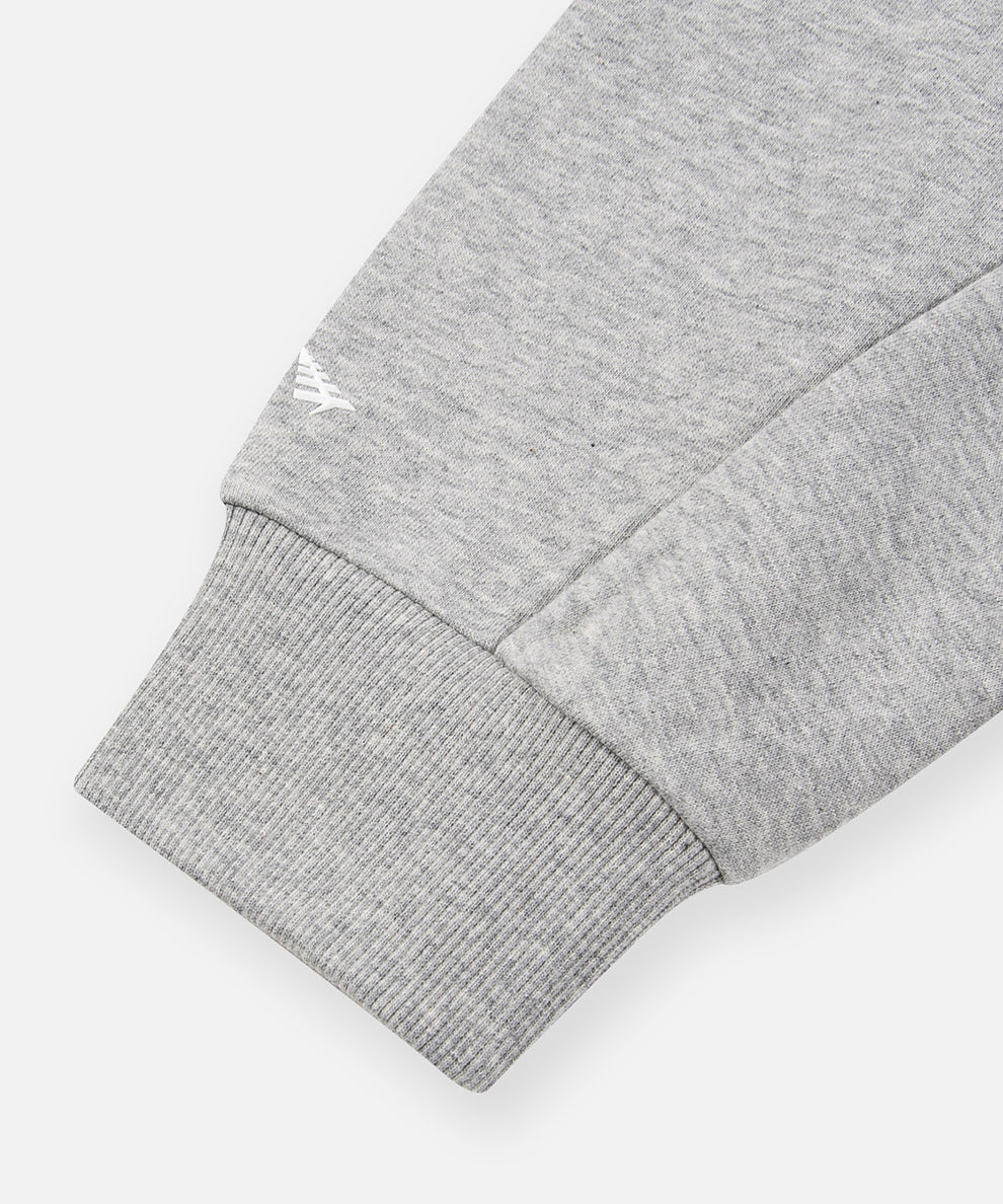 CUSTOM_ALT_TEXT: High-density silicone Plane logo above right cuff on Paper Planes Crest Hoodie, color Heather Grey.