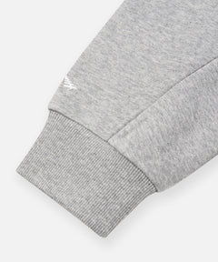  High-density silicone Plane logo above right cuff on Paper Planes Crest Hoodie, color Heather Grey.