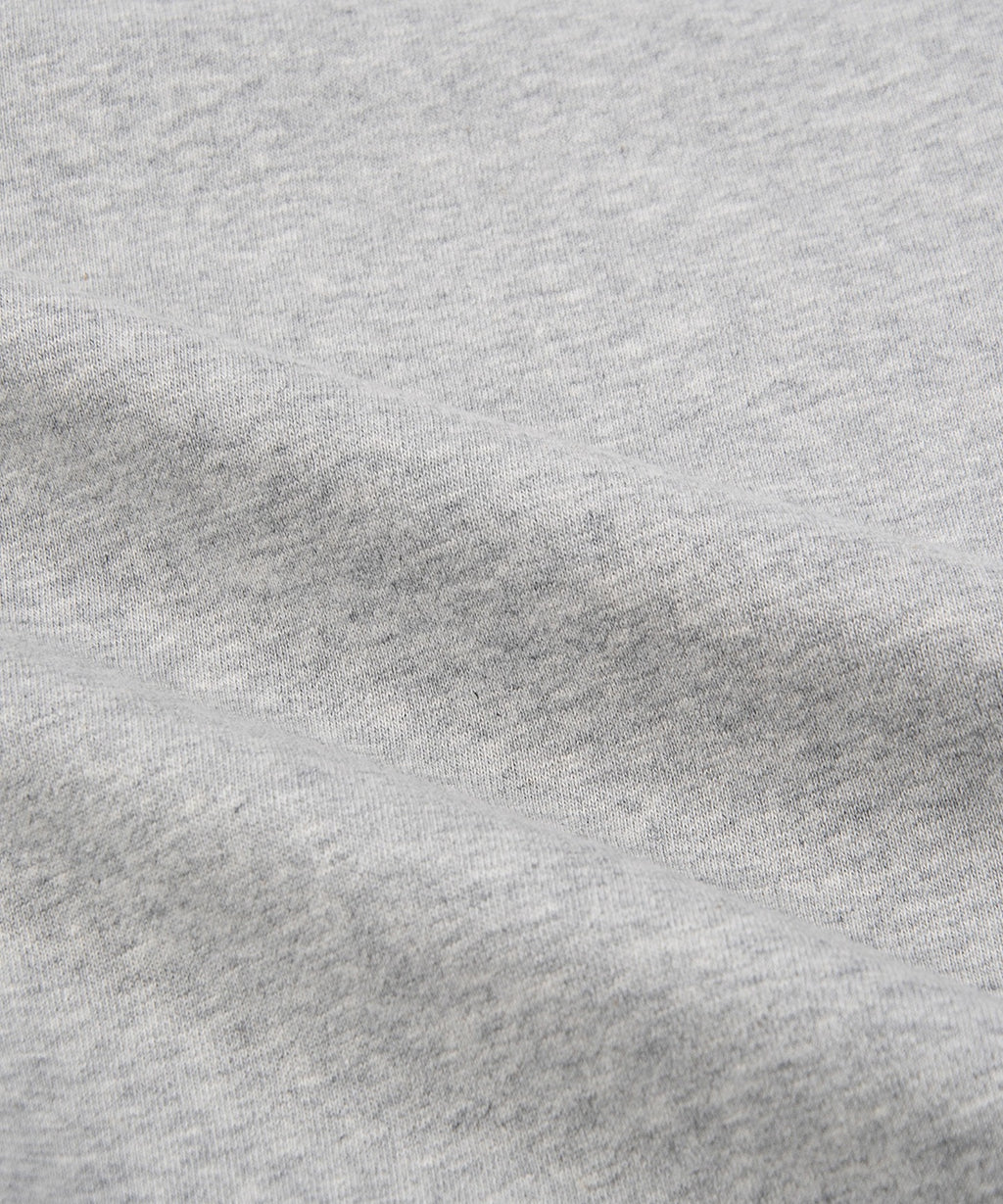  Fabric closeup on Paper Planes Crest Hoodie, color Heather Grey.