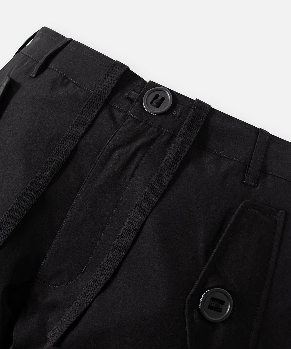 CUSTOM_ALT_TEXT: Front waist detail on Paper Planes Cotton Touch Explorer’s Cargo Pant, color Black.