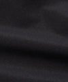 CUSTOM_ALT_TEXT: Fabric closeup on Paper Planes Cotton Touch Explorer’s Cargo Pant, color Black.