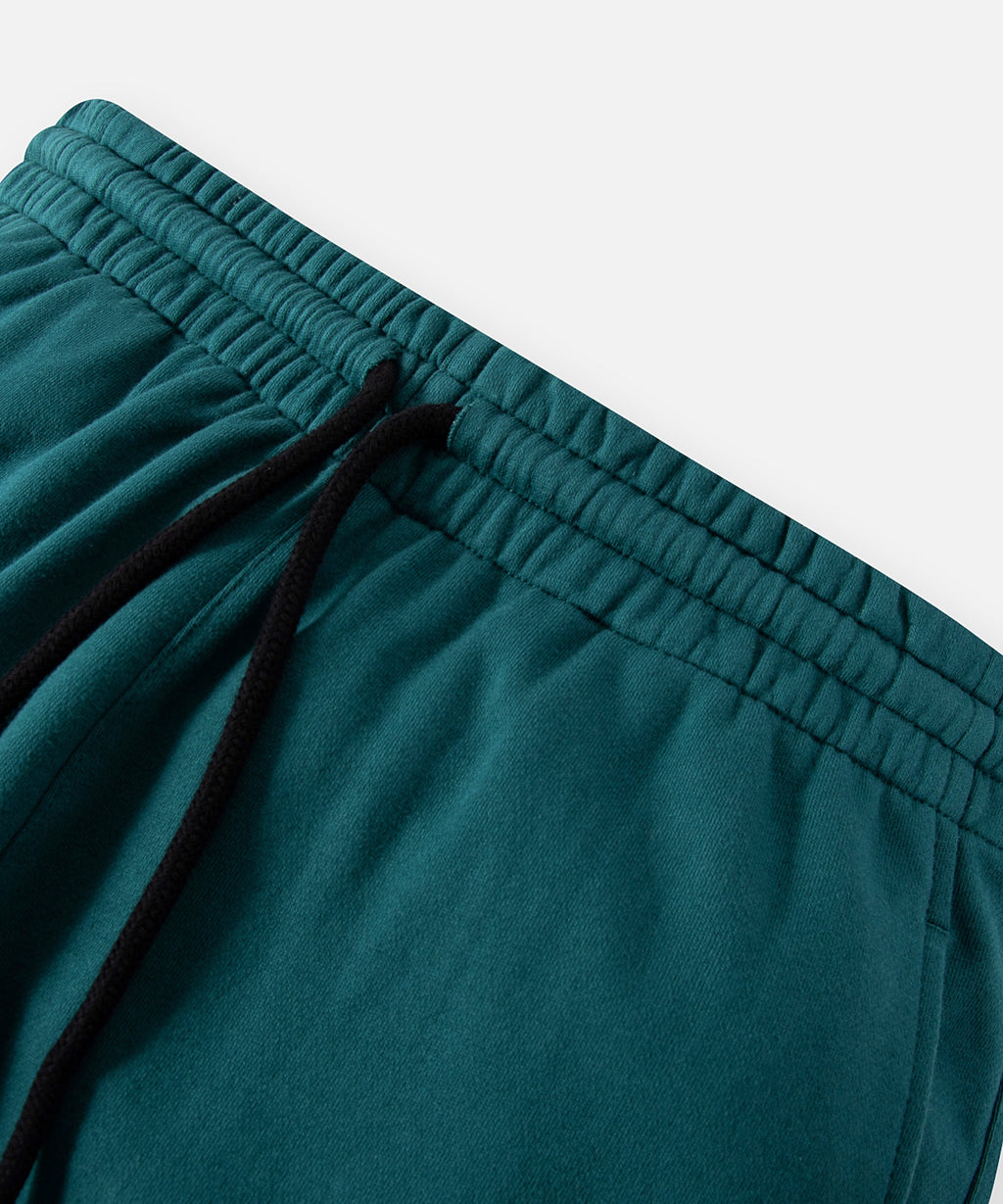  Elasticated waistband and drawcord on Paper Planes Crest Sweatpant, color Atlantic Deep.