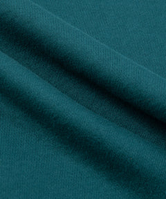  Fabric closeup on Paper Planes Crest Sweatpant, color Atlantic Deep.