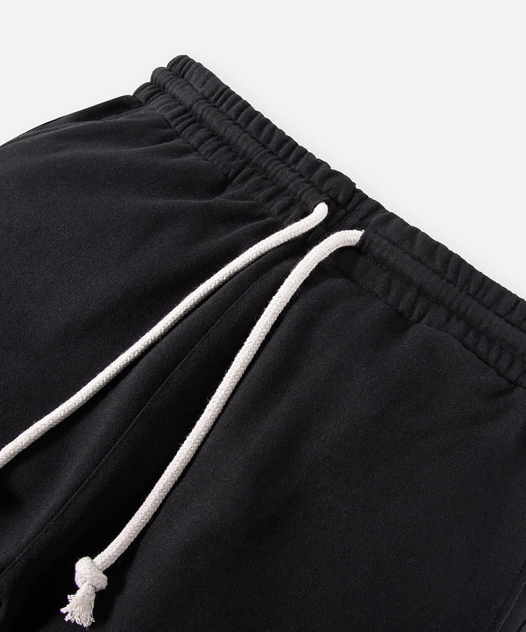  Elasticated waistband and drawcord on Paper Planes Crest Sweatpant, color Black.