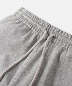  Elasticated waistband and drawcord on Paper Planes Crest Sweatpant, color Heather Grey.