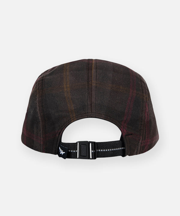 CUSTOM_ALT_TEXT: Back view with adjustable webbing strap and buckle on Paper Planes Wax Cotton Plaid 5-Panel Camper.