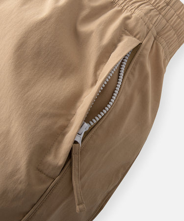 CUSTOM_ALT_TEXT: On-seam pockets with hidden zipper on Paper Planes Cotton Touch Track Pant, color Khaki.
