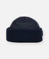 CUSTOM_ALT_TEXT: Side view of Paper Planes Diamond Quilted Beanie, color Indigo.