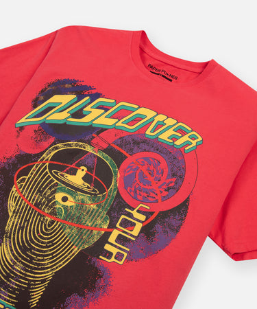 CUSTOM_ALT_TEXT: Closeup of graphic art on Paper Planes Discovery Tee, color Paprika.