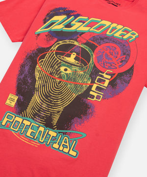 CUSTOM_ALT_TEXT: Printed artwork on front of Paper Planes Discovery Tee, color Paprika.
