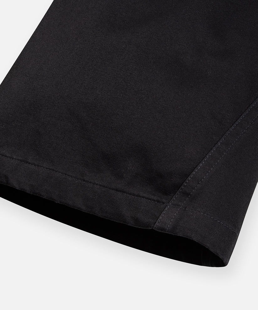 CUSTOM_ALT_TEXT: Gusset at outer leg opening on  Paper Planes Flare Cargo Pant, color Black.