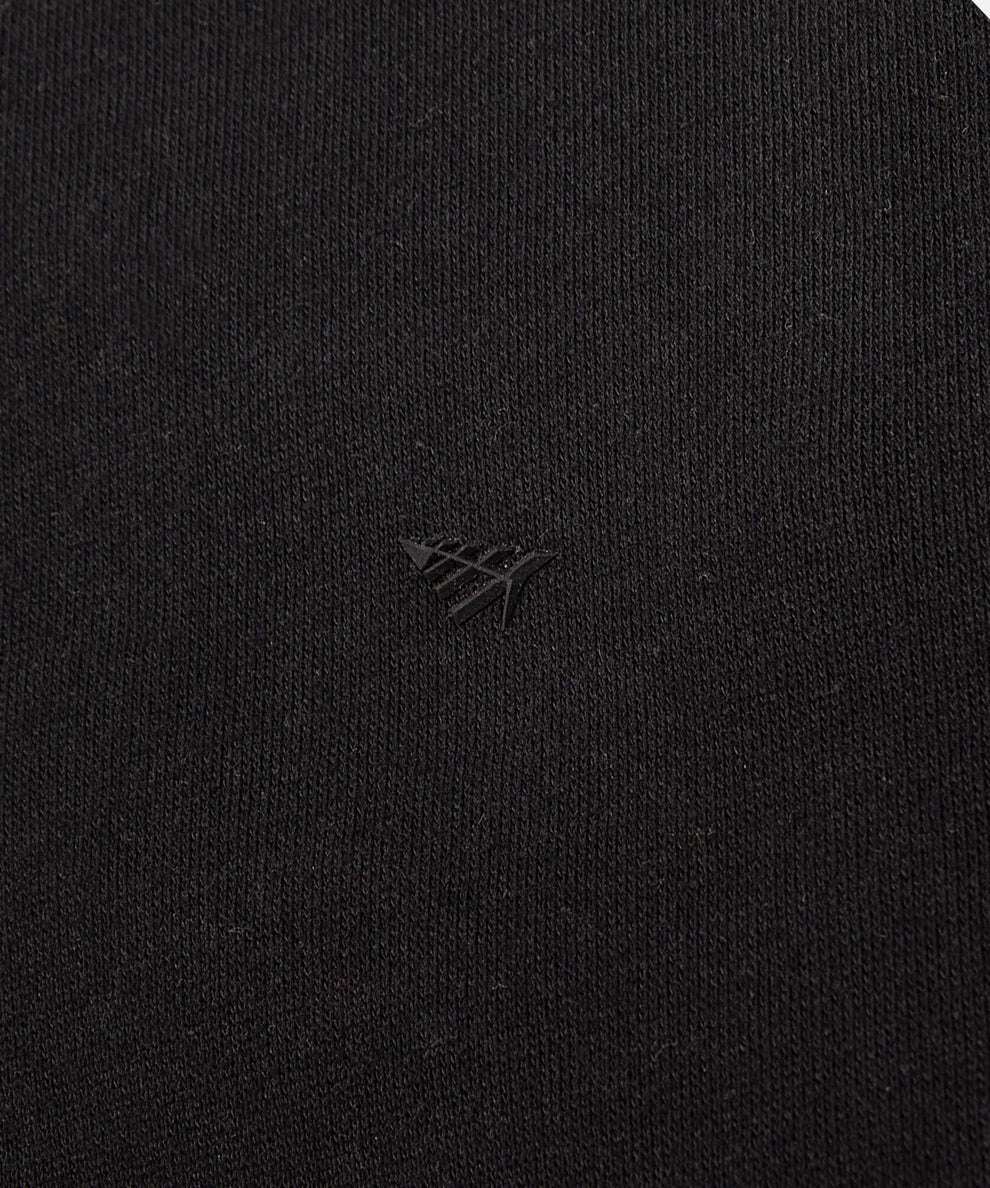 CUSTOM_ALT_TEXT: High-density silicone transfer Plane icon on Paper Planes Dream Lab Sweatshirt, color Black.