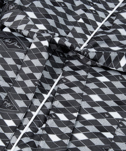 CUSTOM_ALT_TEXT: Belt closure and contrast braided piping along front placket on Paper Planes Diamond Print Robe.