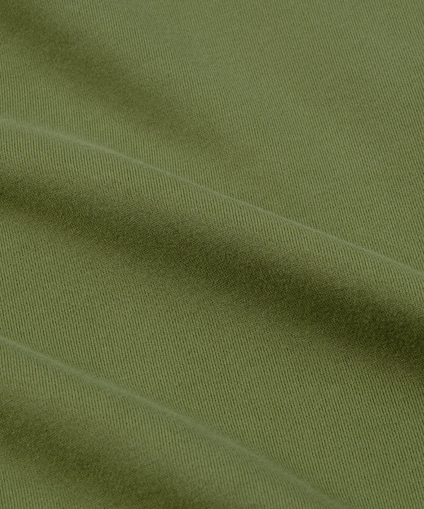 CUSTOM_ALT_TEXT: Closeup of French terry fabric on Paper Planes Logo Jacquard Hoodie, color Bronze Green.