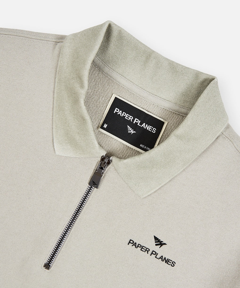 Paper Planes Lockup Quarter Zip Polo