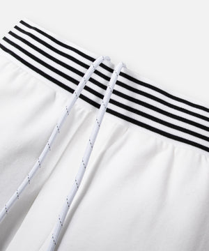 CUSTOM_ALT_TEXT: Striped rib waistband with drawcord on Paper Planes Gusset Short color White.