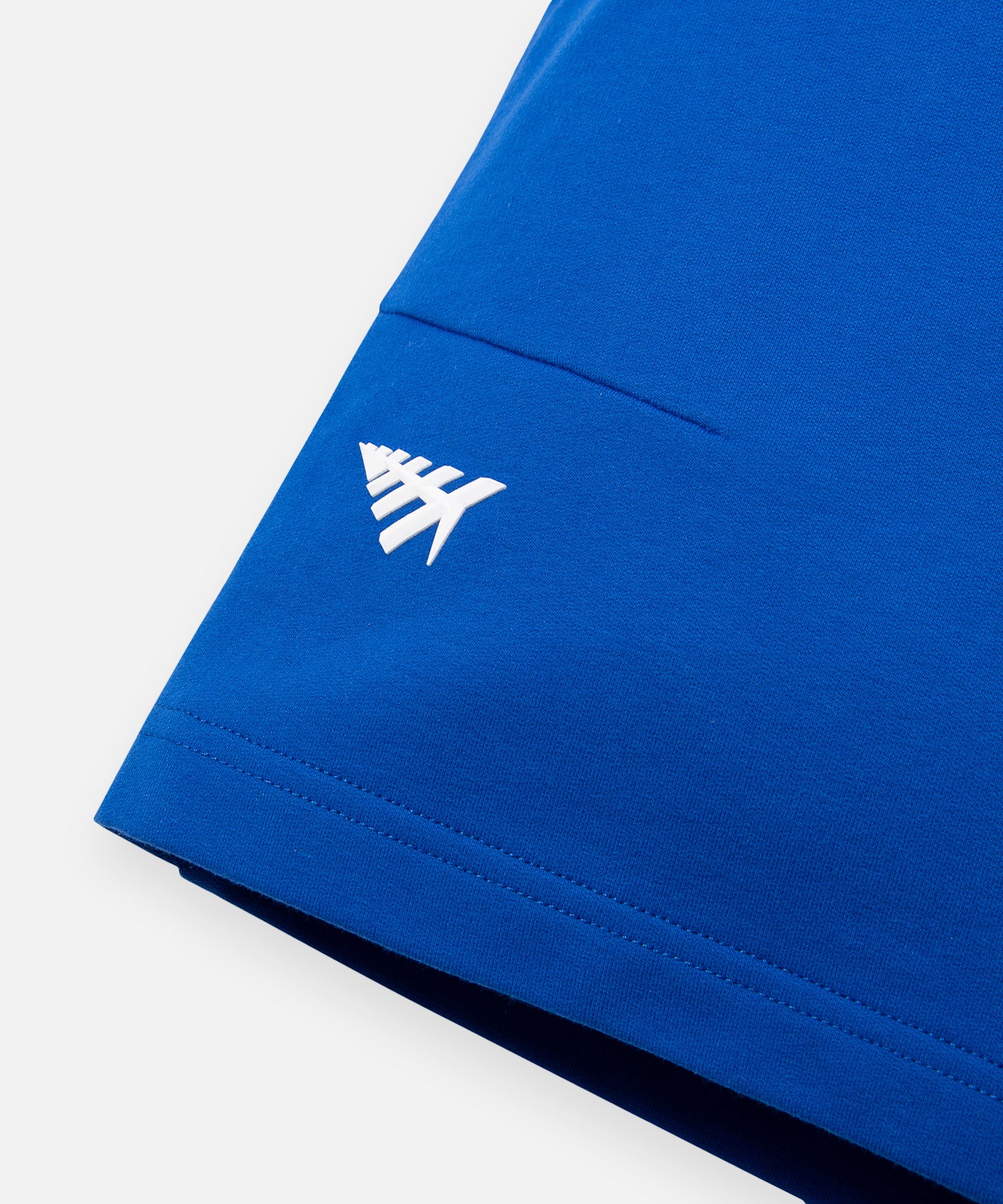 CUSTOM_ALT_TEXT: Silicone Plane logo on front of Paper Planes Gusset Short color Nautical Blue.