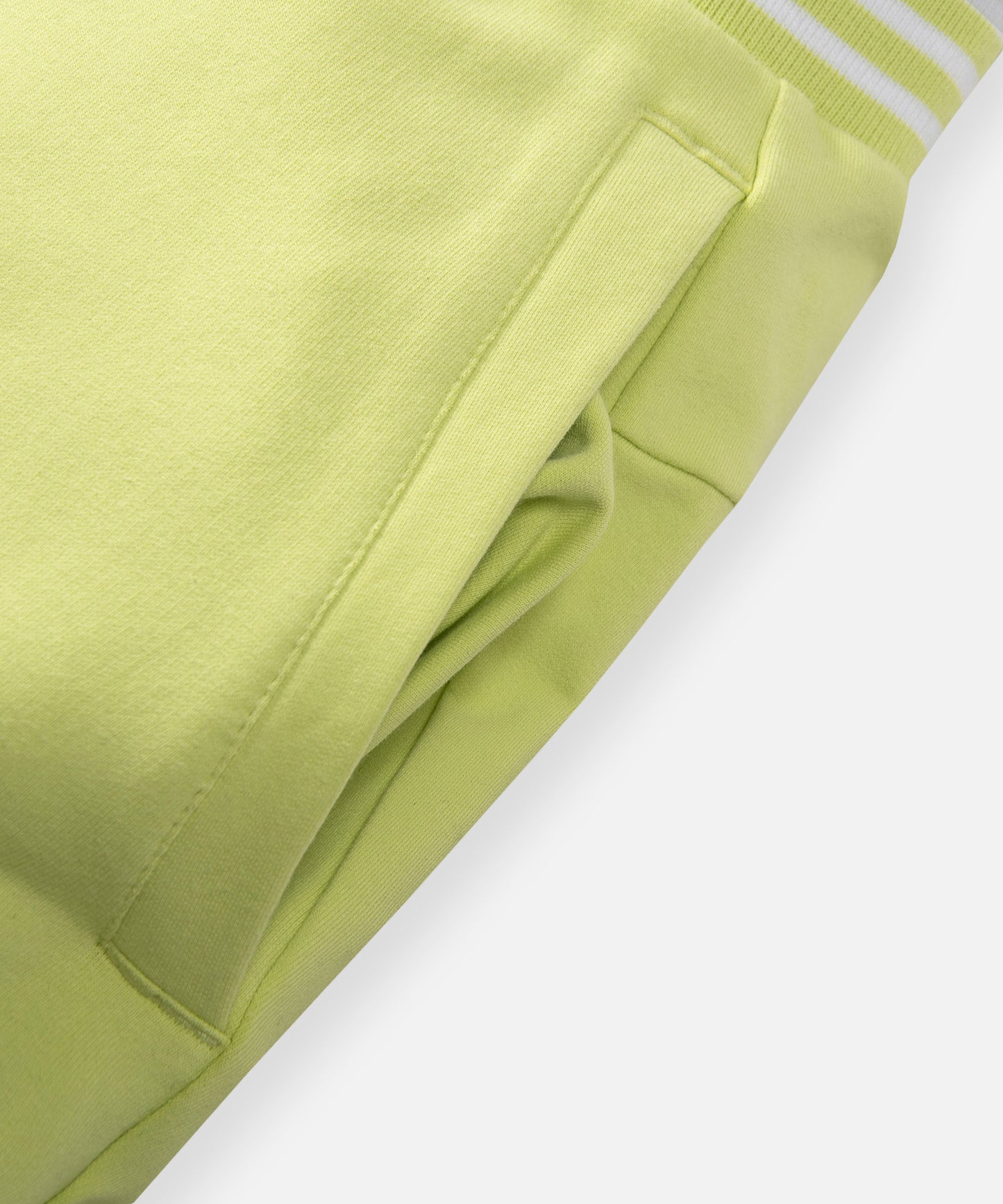 CUSTOM_ALT_TEXT: On-seam front welt pocket on Paper Planes Gusset Short color Lime Sherbet.