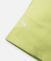 CUSTOM_ALT_TEXT: Silicone Plane logo on front of Paper Planes Gusset Short color Lime Sherbet.