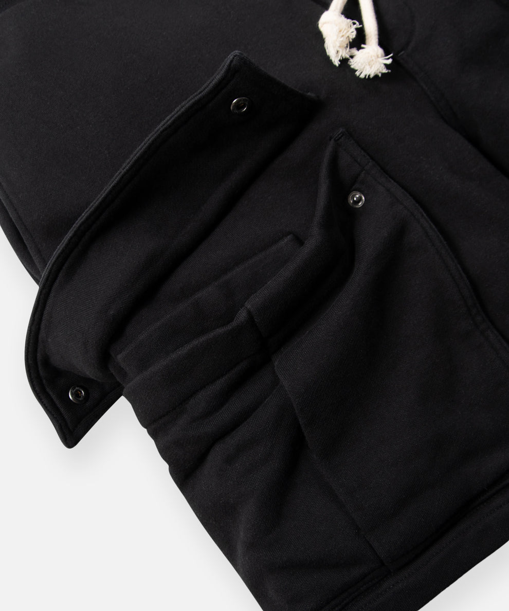 CUSTOM_ALT_TEXT: Hidden pocket inside cargo pocket on Paper Planes Super Cargo Knit Short color Black.