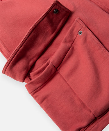 CUSTOM_ALT_TEXT: Hidden pocket inside cargo pocket on Paper Planes Super Cargo Knit Short color Mineral Red.