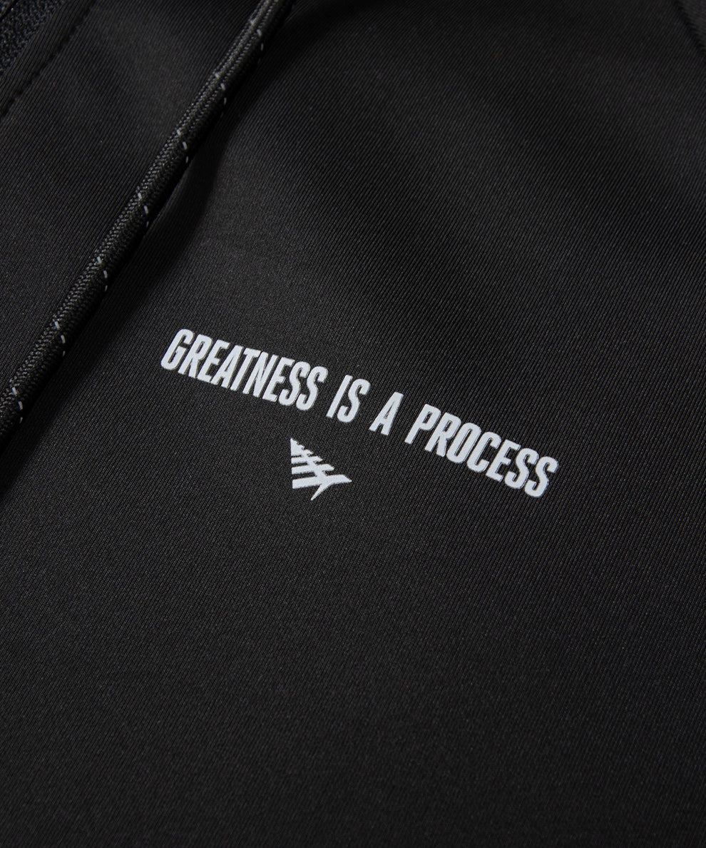 CUSTOM_ALT_TEXT: GREATNESS IS A PROCESS and Plane icon print on Paper Planes Greatness Is a Process Zip-Up Hoodie, color Black.