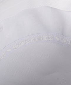 GREATNESS IS A PROCESS interior taping on Paper Planes Jacquard Terry Cloth Bucket Hat color White.