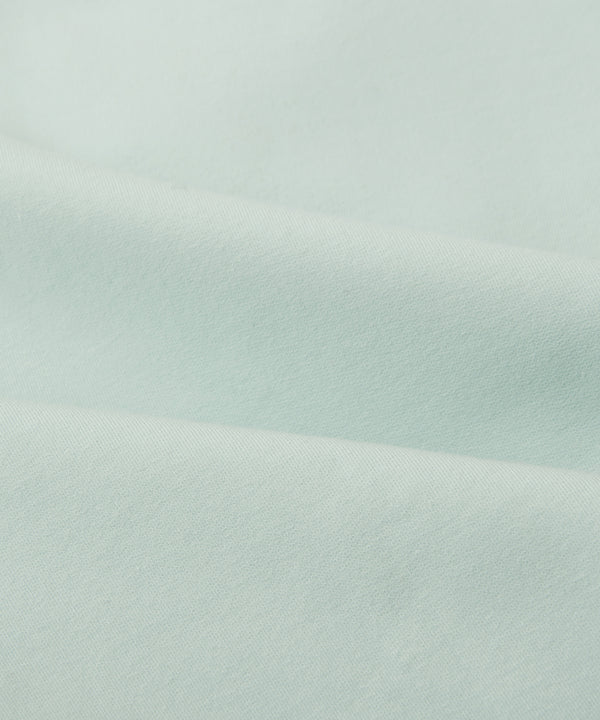 CUSTOM_ALT_TEXT: Fabric closeup on Paper Planes Chromatic Crewneck Sweatshirt color Powder Blue.