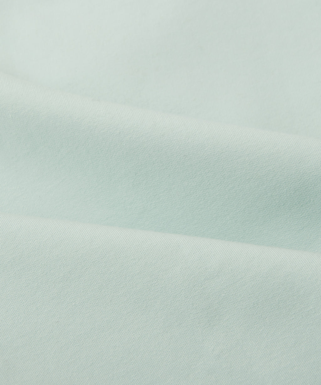  Fabric closeup on Paper Planes Chromatic Crewneck Sweatshirt color Powder Blue.