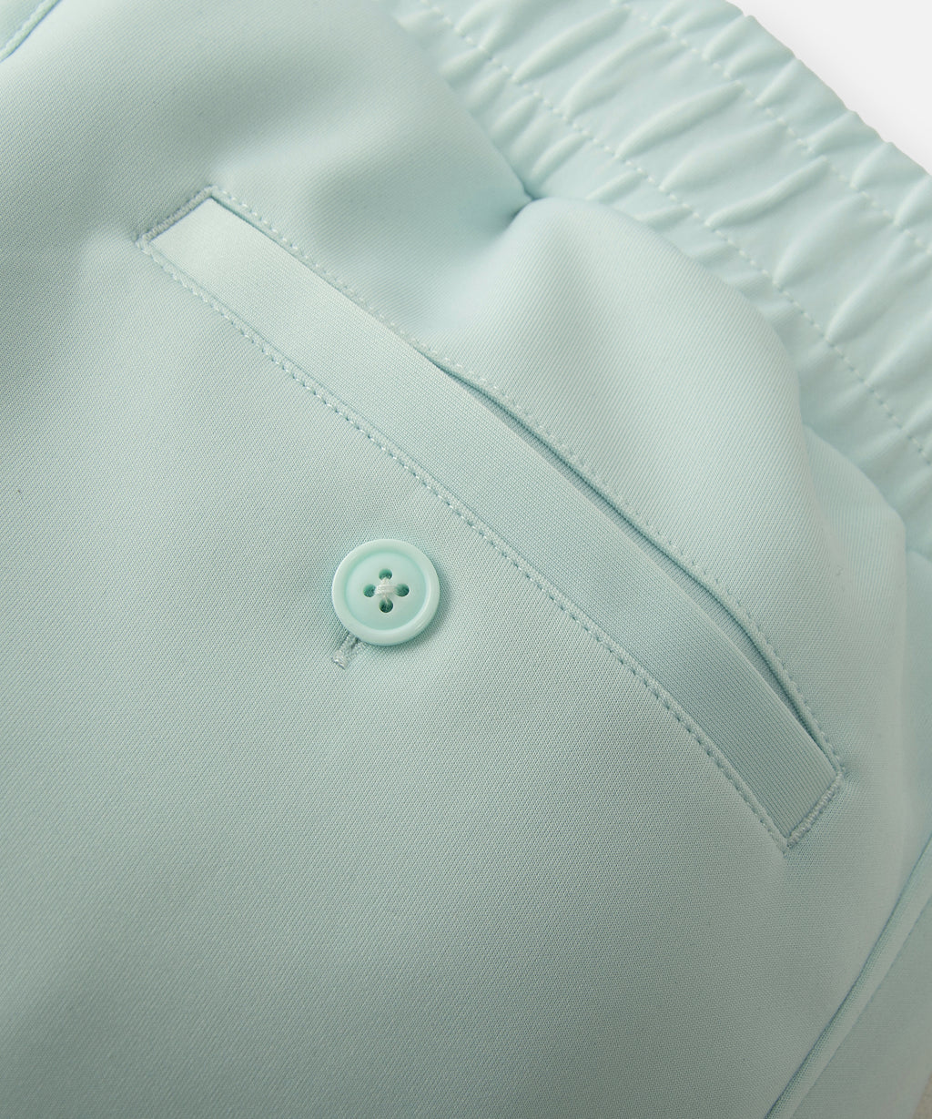  Single welt button-through back pocket on Paper Planes Slim Fit Chromatic Jogger color Powder Blue.