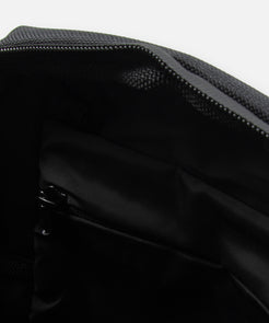 CUSTOM_ALT_TEXT: Interior compartment view of Paper Planes Quilted Sling Bag.